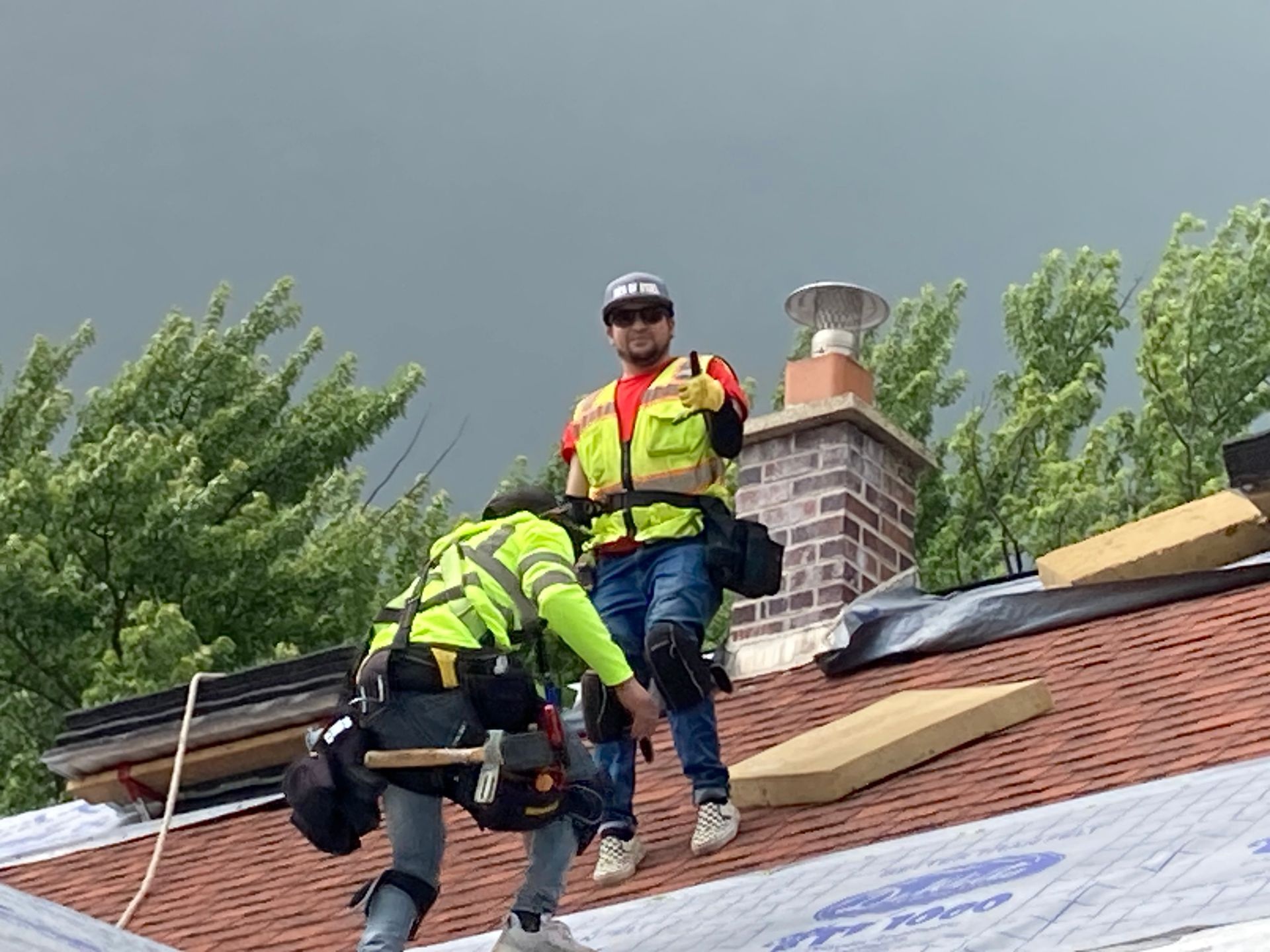 Tex Roof crew replacing a roof on a new-construction home in Leander, Texas
