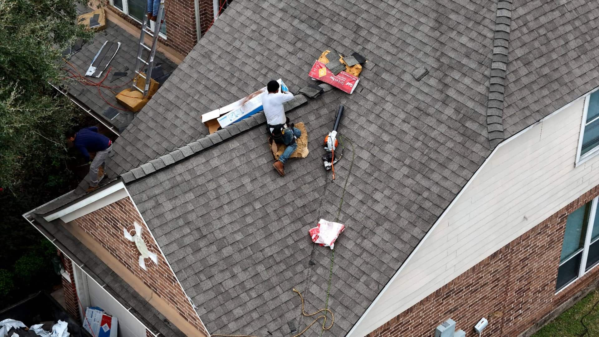 Tex Roof crew member on a job site in Austin